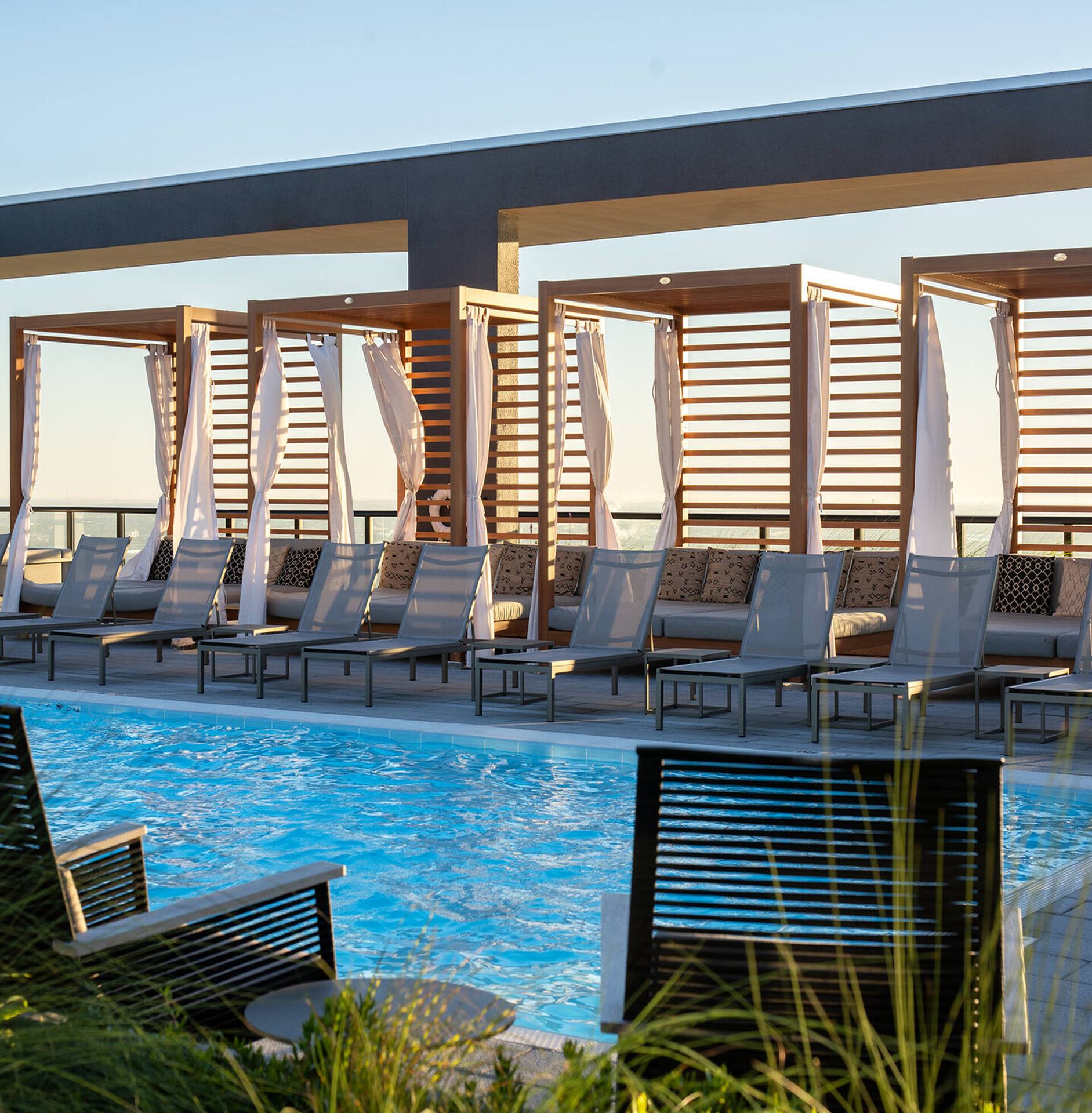 Rooftop pool deck at Heron's luxury apartments in Tampa, FL